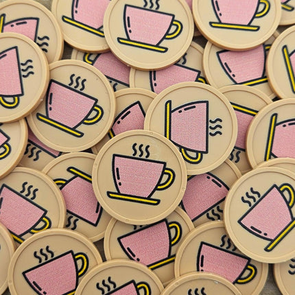 Fichas de plastico icono cafe en rosado Ø29mm - por 100 unidades