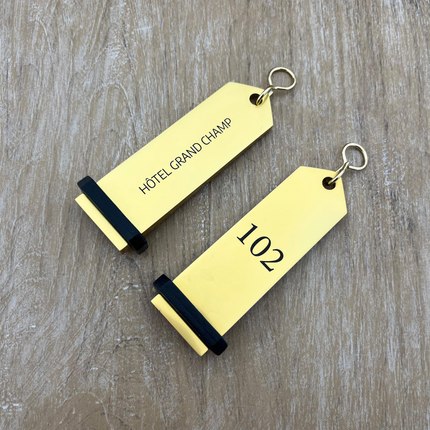 Llavero para hotel Bumerang personalizable Dorado -Por unidad