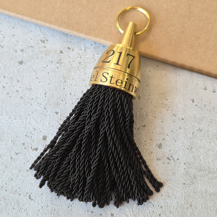 Llavero para hotel Philadelphia de laton grabado con borlon negro - Por unidad